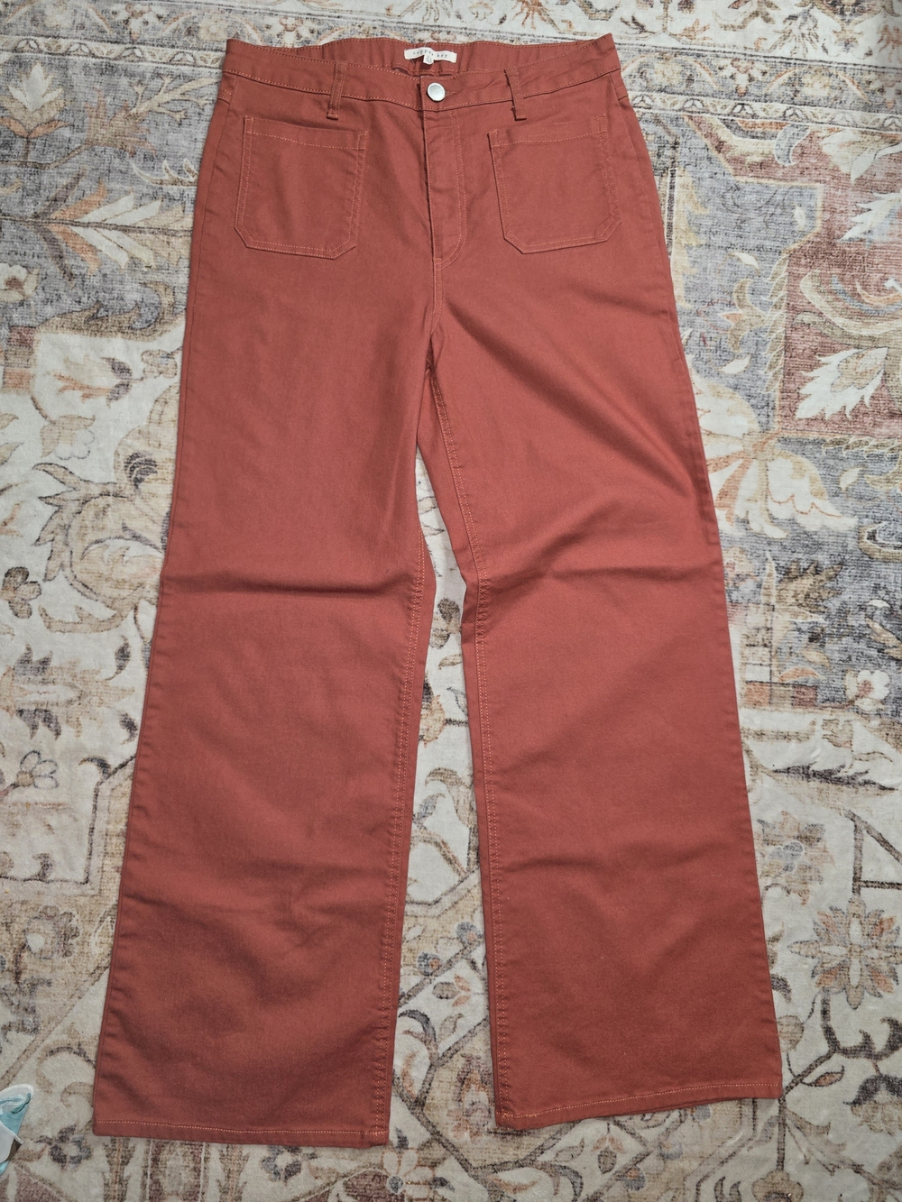 Copper Key High-Rise Wide-Leg Jeans in Rust